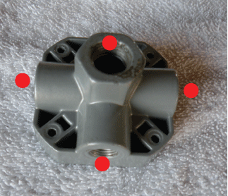 Four ported air compressor manifold
